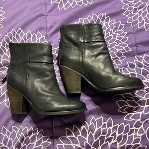 Arturo Chiang black leather booties, zips up the back, heel height is 31/2 inch